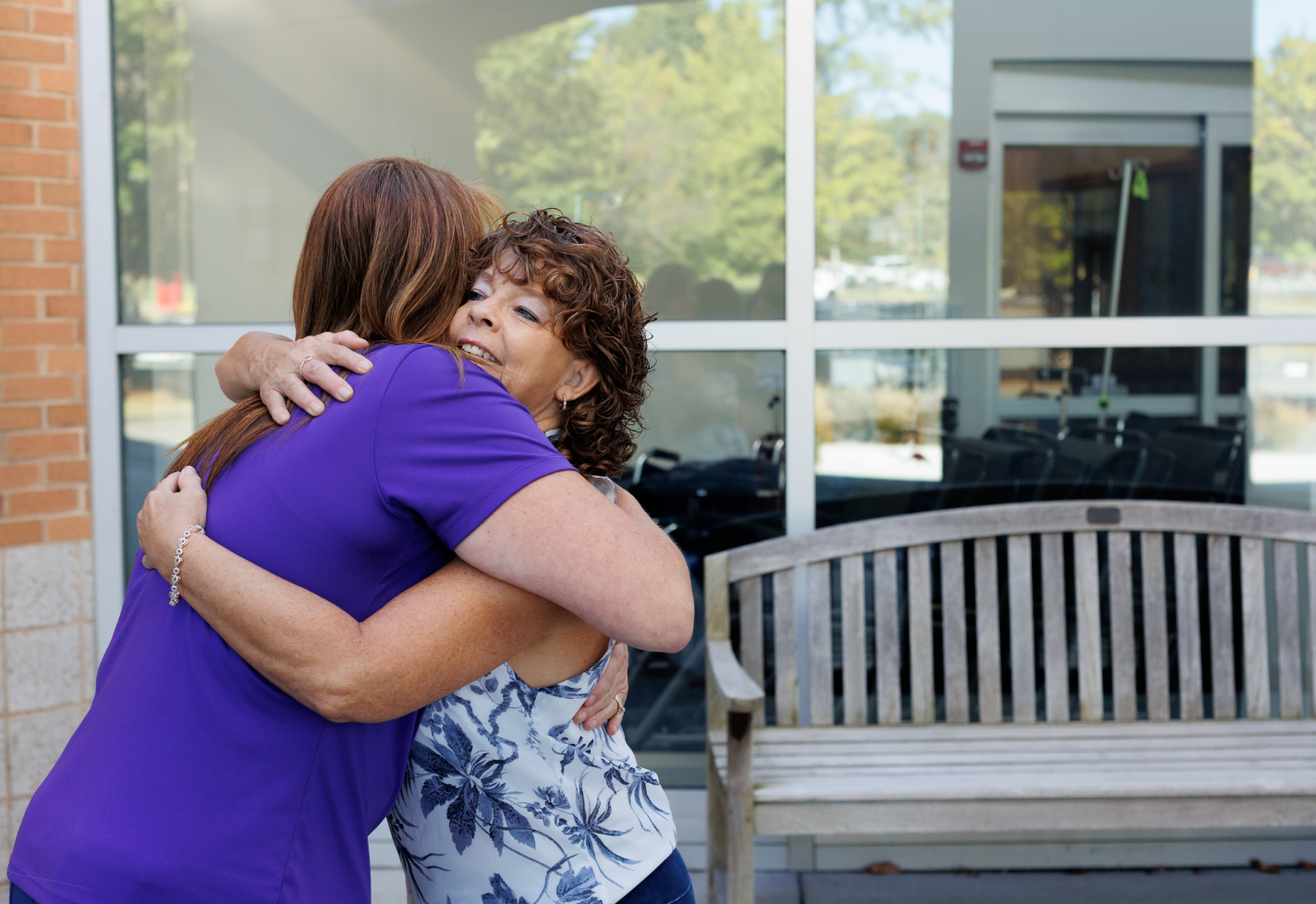 Vanessa and Lynn Hopkins hugging