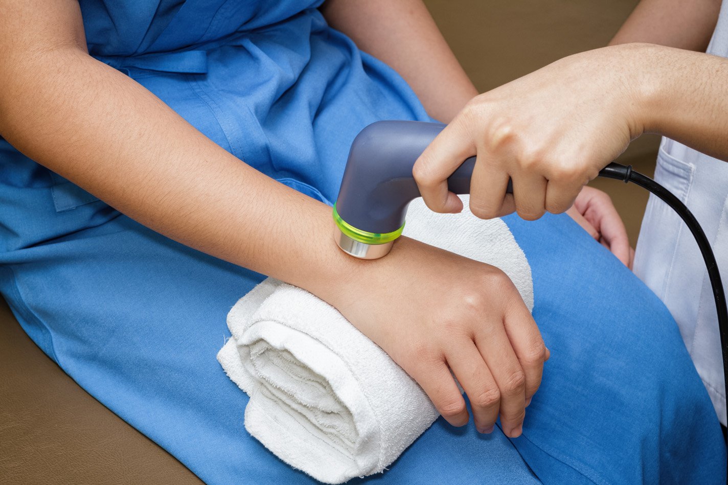 Patient having an ultrasound of the wrist.