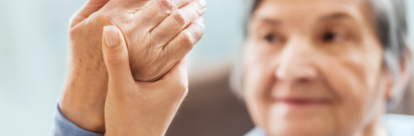 Elderly patient has a wrist exam